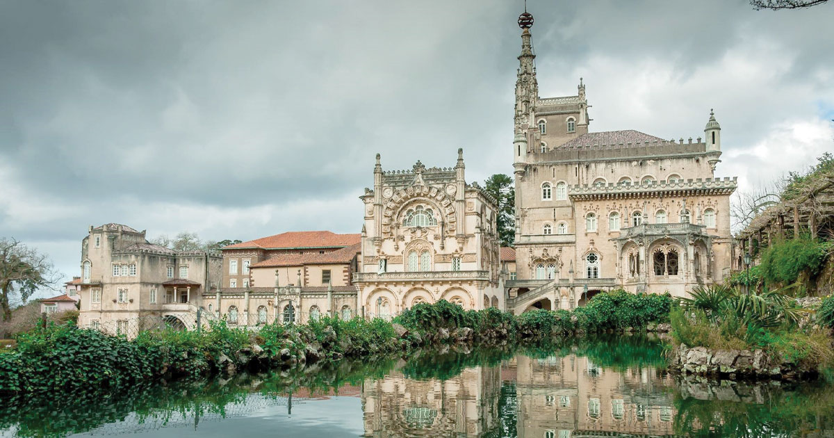Palace Hotel do Buçaco Neo-Manueline Gothic façade reflected in water