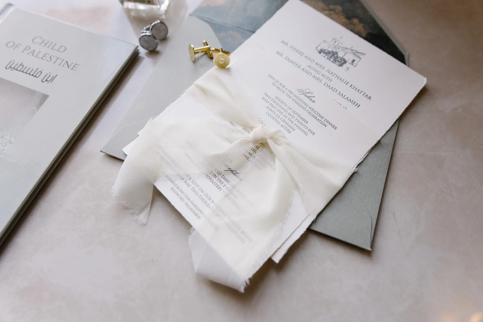 Luxury wedding invitation suite with silk ribbon and cufflinks