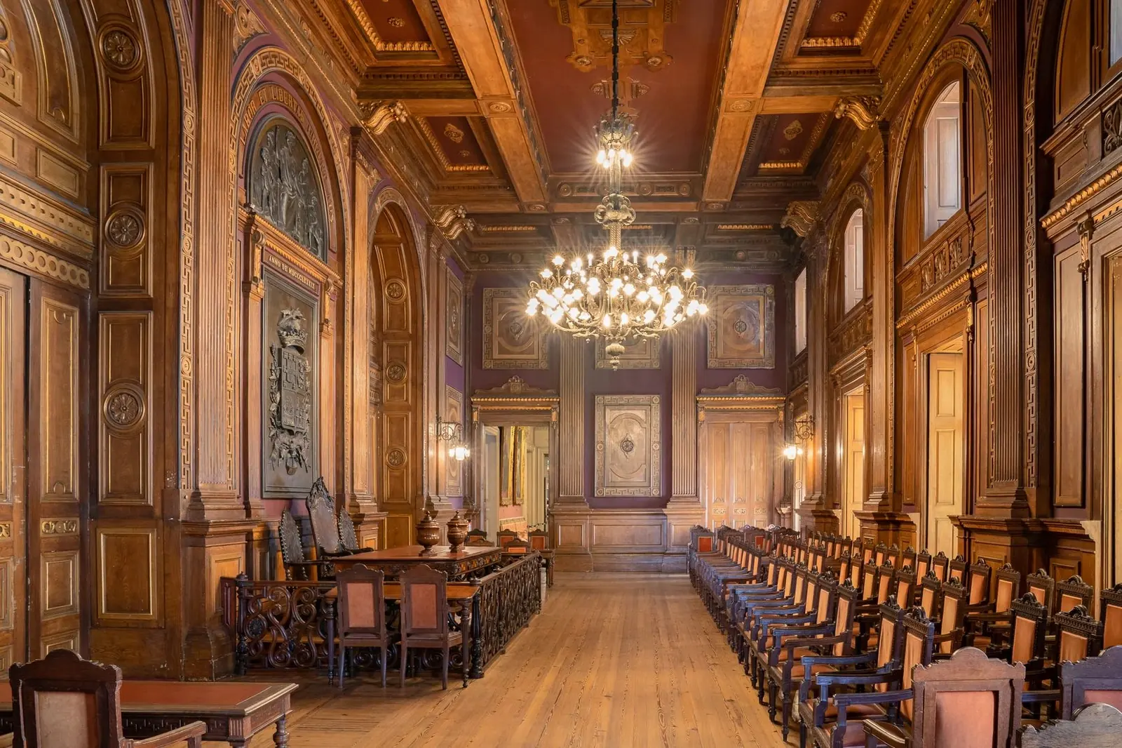 The Assembly Hall at Palácio da Bolsa arranged for a small wedding gathering with freestanding decor.