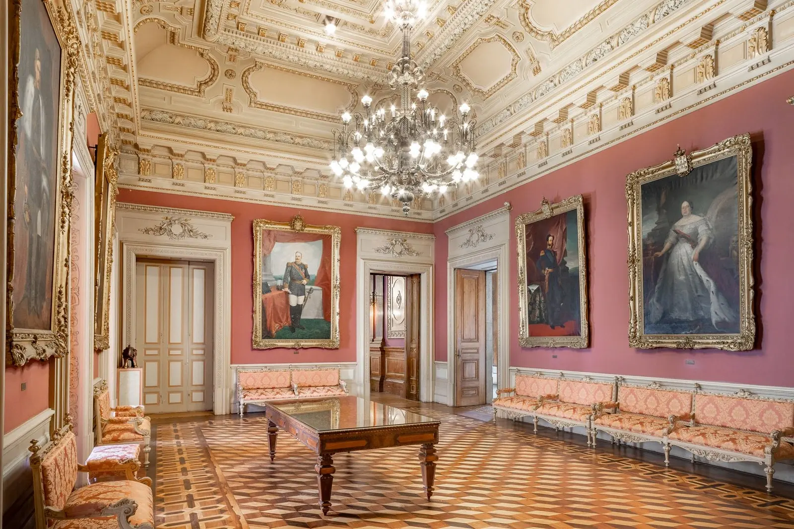The Portrait Room at Palácio da Bolsa set for a small family wedding dinner in Porto.