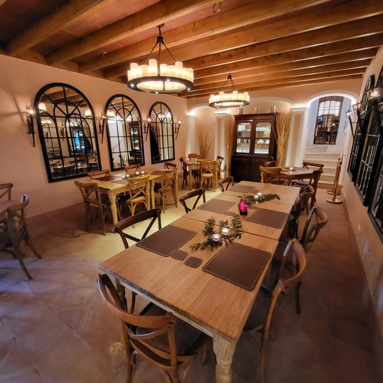 The Adega at Quinta da Bella Vista, Sintra, a wine-cellar tavern with vaulted ceiling set for a wedding dinner