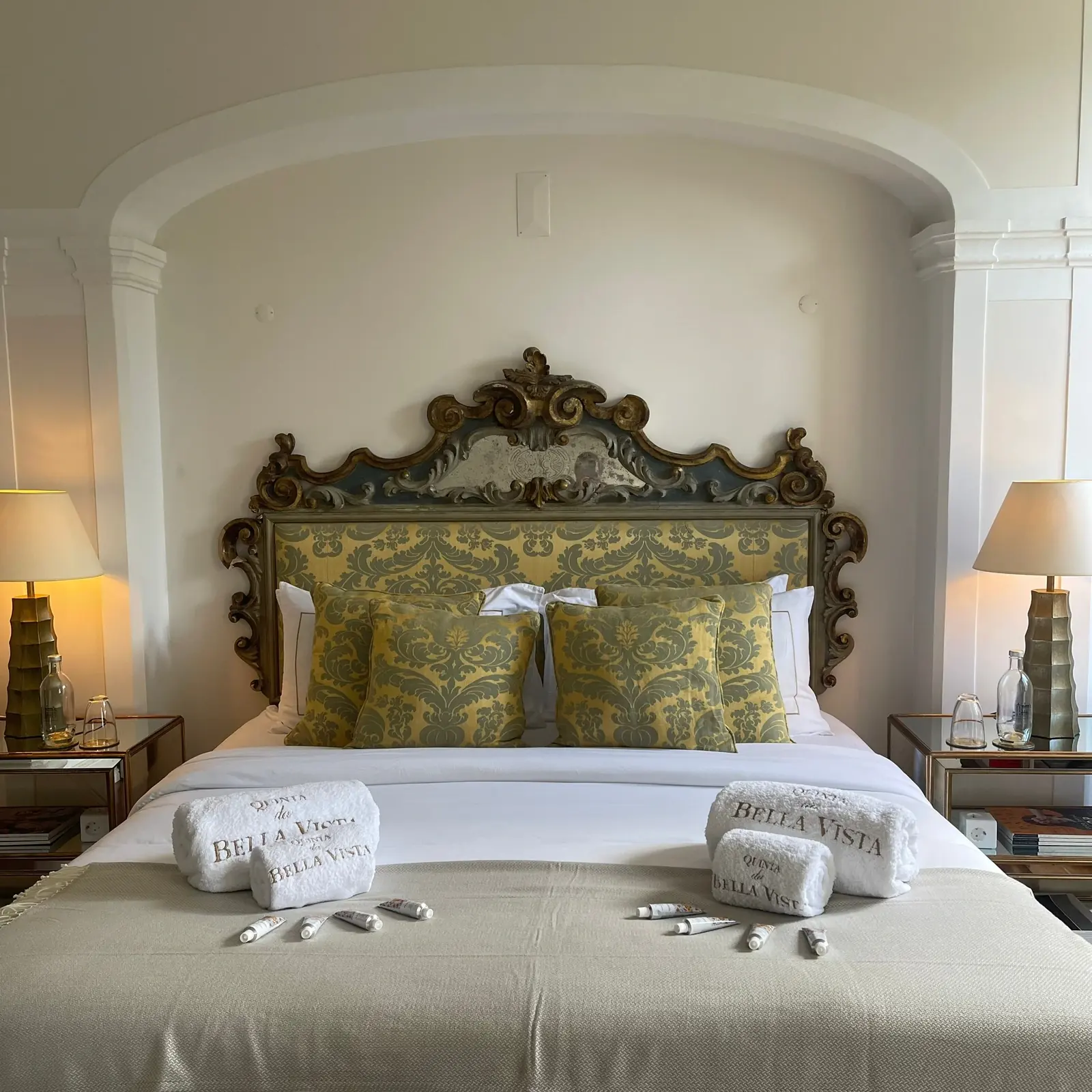 Suite at Quinta da Bella Vista with antique carved headboard and garden light