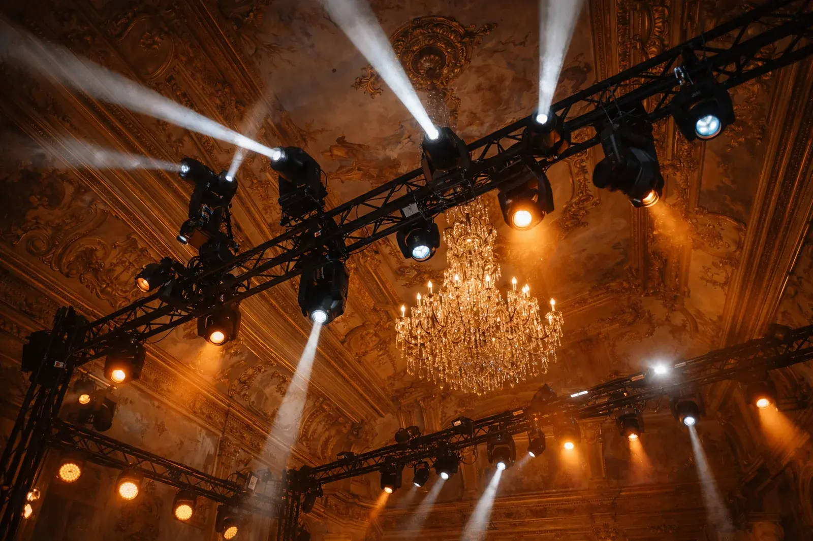 Professional lighting rig installation in historic palace