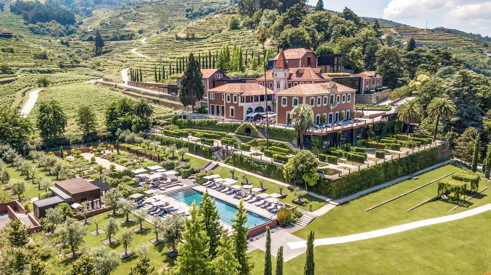 Six Senses Douro Valley · restored 19th-century quinta and terraced vineyards above the river in the UNESCO Douro, the setting for a vineyard wedding produced by Event Boutique
